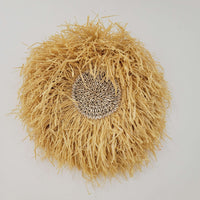 Seashell & Raffia juju hat Wall Decor - Boho, handmade rustic straw wall art with sunflower seed cluster and natural fibers.