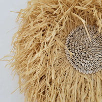 Seashell & Raffia juju hat Wall Decor - Boho, featuring natural straw and sunflower seed design.