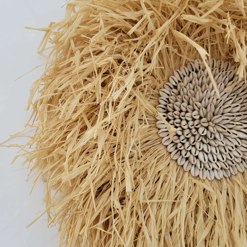 Seashell & Raffia juju hat Wall Decor - Boho, featuring natural straw and sunflower seed design.