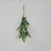 Artificial Christmas mistletoe hanging decoration with red berries and hemp rope.