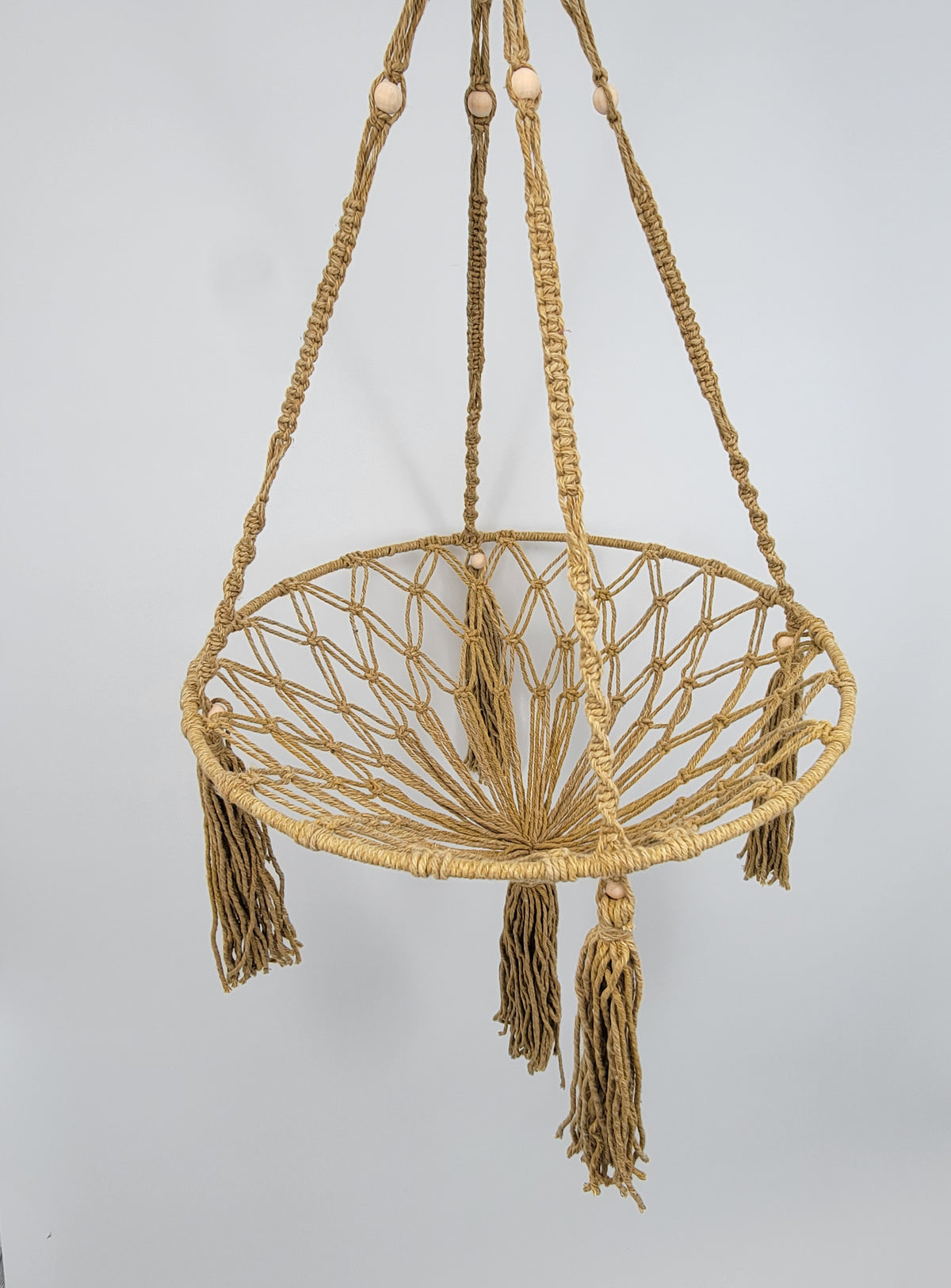 macrame cat hammock made of cotton yarns with tassels, perfect for lounging cats and stylish cat decor.